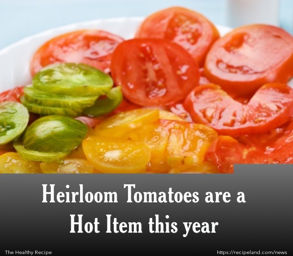 Plate of colorful fresh, juicy sliced Heirloom Tomatoes