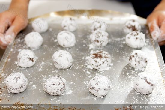 Roll 1 tablespoon dough into ball, 