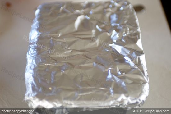 Cover dough with extended ends of foil.