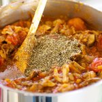 Reduce the heat to medium low, add the Italian seasoning mix, 