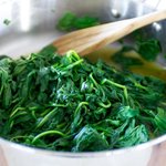 Cook the spinach leaves until they are all welted, about 3 to 5 minutes.
