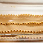 Arrange three lasagna noodles,
