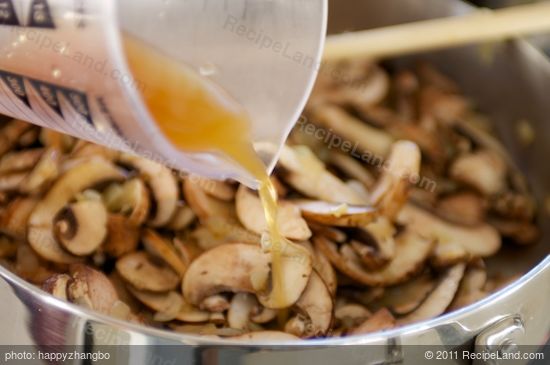 Pour stock into skillet.