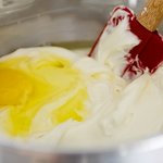 Add eggs, one at a time, 