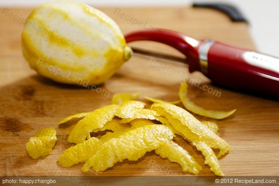 Meanwhile peel the lemon peels into strips.