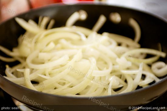 Add the onions to the skillet