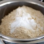 Sift together the flour, baking powder, baking soda, and salt in a large bowl. 