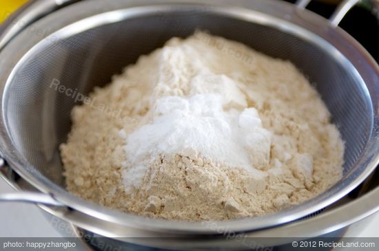 Sift together the flour, baking powder, baking soda, and salt in a large bowl. 