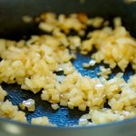 Cook the onions until tender and slightly browned.