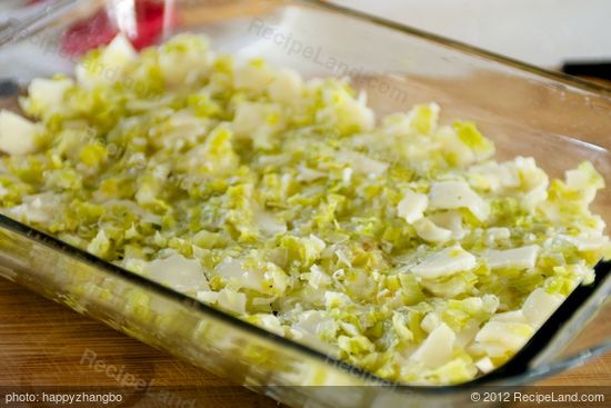 Spread leek-cheese mixture evenly onto bottom of pie plate.  