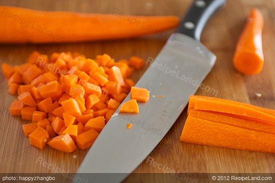 Peel and chop the carrots.