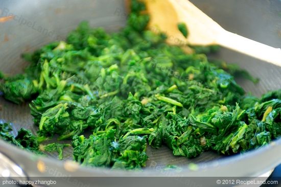 and cook until the spinach are thawed and wilted, 2 to 3 minutes. 