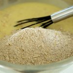 Add the flour mixture to the oats-egg mixture,
