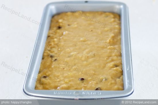 Pour into loaf pan that's well greased with butter,  