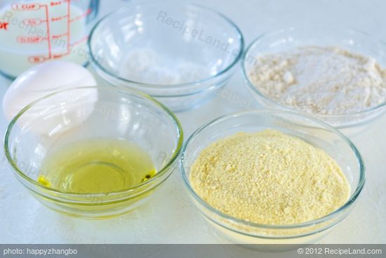 While the chili is simmering, prepare the cornbread topping.