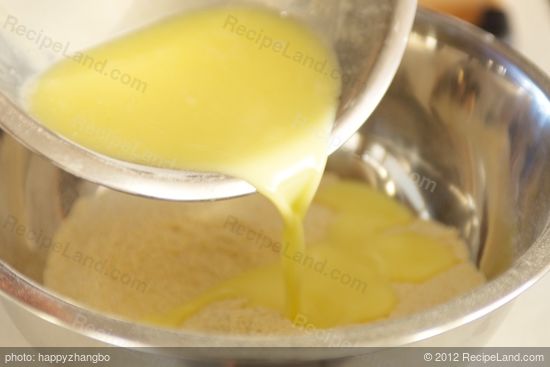 Pour into flour mixture.