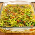 Pour into casserole dish with quinoa and broth.  