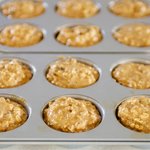 Pour into greased muffin tins,