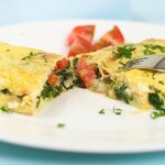 Breakfast Spinach and Tomato Cheese Omelet