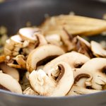 Stir in mushrooms,