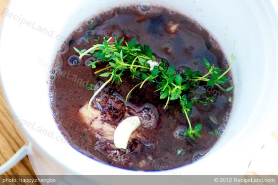 Add the red wine mixture to the slow cooker with a boquet garni