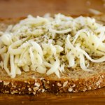 Next sprinkle Italian seasoning over cheese.
