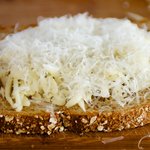 Next sprinkle parmesan cheese if using.