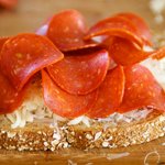 Then slices of pepperoni.