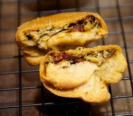 Sun-dried Tomato, Basil Pesto and Artichoke Pizza Rolls