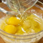 Add oil, egg whites into bananas.