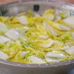 Add the cabbage slices into salt water.