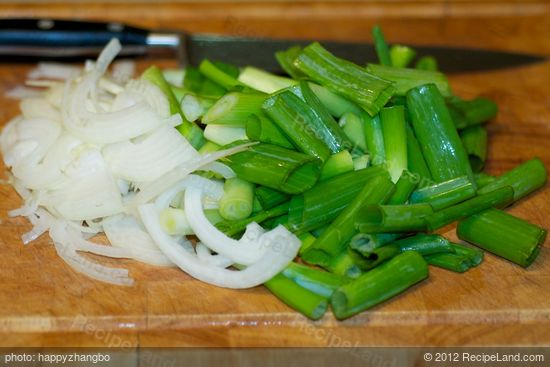 Thinly slice the onion and cut scallions into 2-inch pieces.