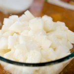 Place the daikon cubes in a large bowl, 