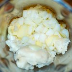 Add onion, garlic, ginger, apple, rice and water in a food processor or a blender.