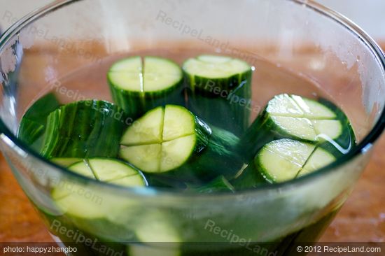 Add all the cucumber logs into a large bowl.  