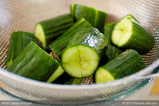 After 1 hour, drain the cucumbers and rinse with cold and running water twice. 