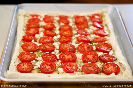 Place tomato slices,