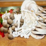 Chop up bell peppers into cubes, and prepare the mushrooms.