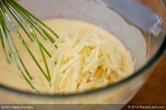 Mix ingredients until blended. Add grated cheese.