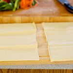 Cut the tofu sheet crosswise into half.