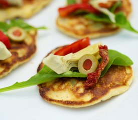 Fresh Corn Blinis with Roasted Bell Pepper, Artichoke Hearts and Arugula