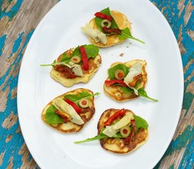 Fresh Corn Blinis with Roasted Bell Pepper, Artichoke Hearts and Arugula