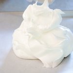 Egg whites have been well whipped with sugar.