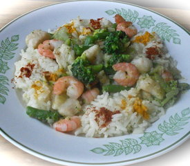 Shrimp and Fish with Green Vegetables in Orange Sauce