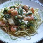 Shrimp and Fish with Green Vegetables in Orange Sauce