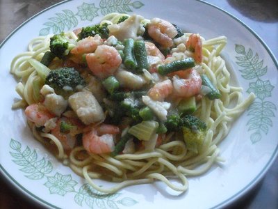 Shrimp and Fish with Green Vegetables in Orange Sauce