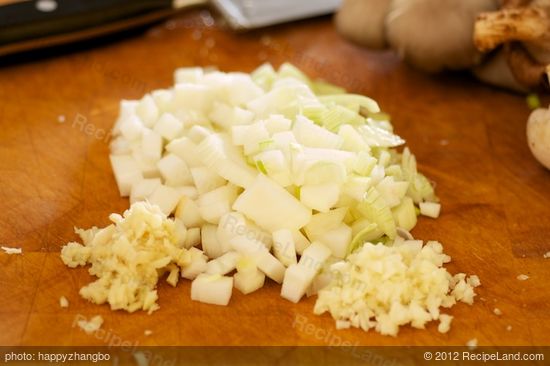 Next chop up the onions, garlic and ginger.