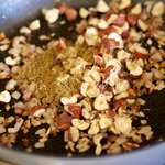 Add the cumin and hazelnuts.