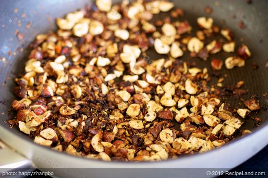 Toast the nuts for about 3 minutes, until lightly browned.