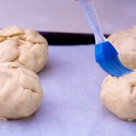 brush tops with egg white.